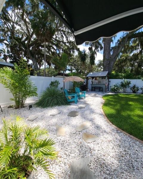 5710 Broadway Ave, New Port Richey, FL 34652 - view of yard with a patio area