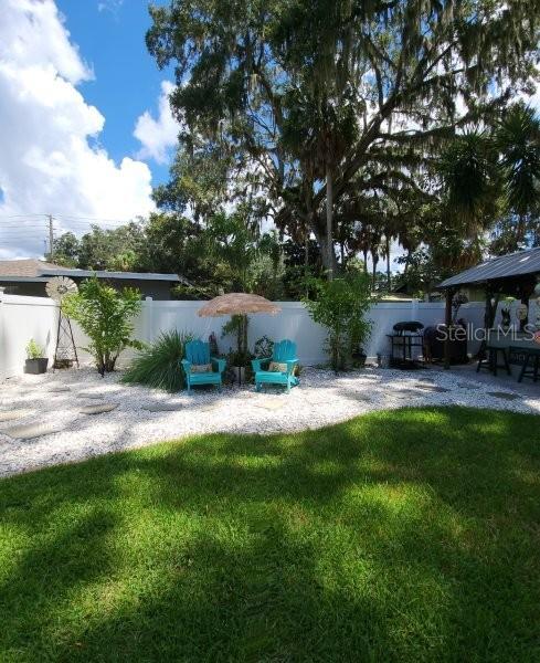 5710 Broadway Ave, New Port Richey, FL 34652 - view of yard with a patio area
