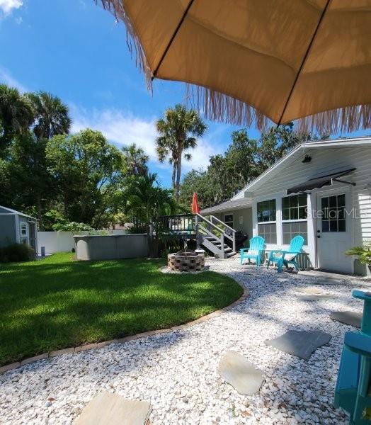 5710 Broadway Ave, New Port Richey, FL 34652 - view of grassy yard featuring a patio area