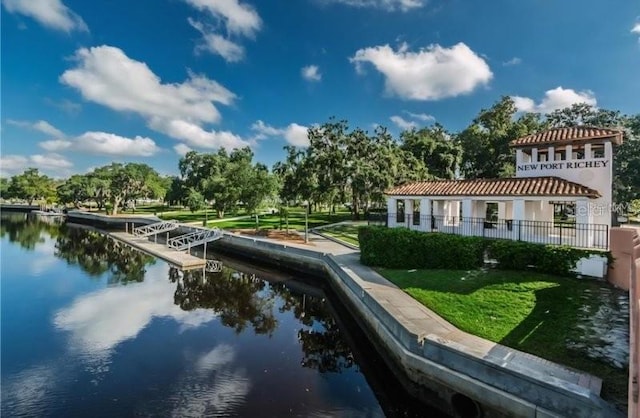 5710 Broadway Ave, New Port Richey, FL 34652 - view of community with a water view and a lawn