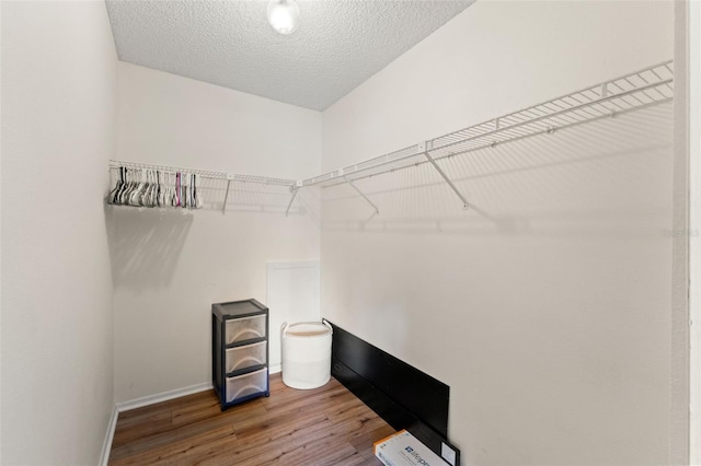 6085 Pekin Ct, Spring Hill, FL 34606 - spacious closet with wood finished floors