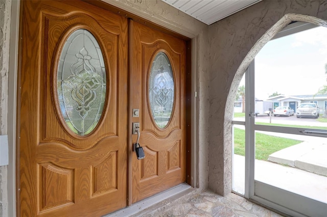 13637 Lagoon Dr, Hudson, FL 34667 - view of exterior entry with covered porch