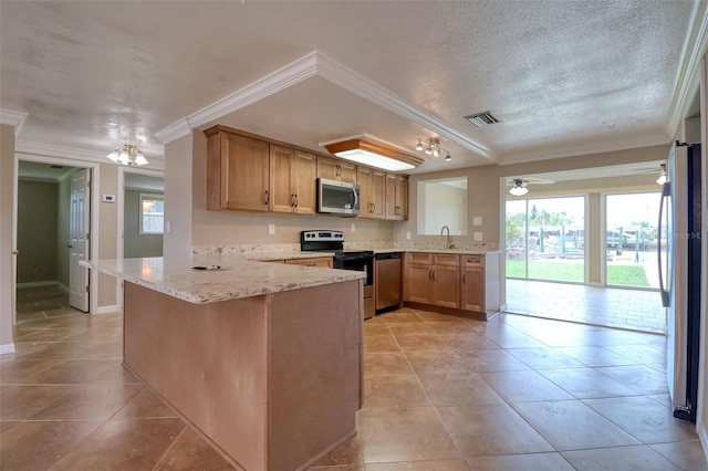 13637 Lagoon Dr, Hudson, FL 34667 - kitchen featuring stainless steel appliances, a peninsula, ornamental molding, light stone countertops, and light tile patterned floors