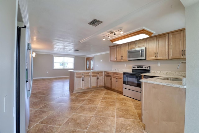 13637 Lagoon Dr, Hudson, FL 34667 - kitchen featuring appliances with stainless steel finishes, a peninsula, crown molding, light brown cabinetry, and light stone counters
