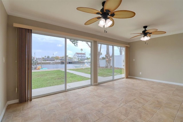 13637 Lagoon Dr, Hudson, FL 34667 - empty room with a water view, a ceiling fan, crown molding, and light stone finish floors