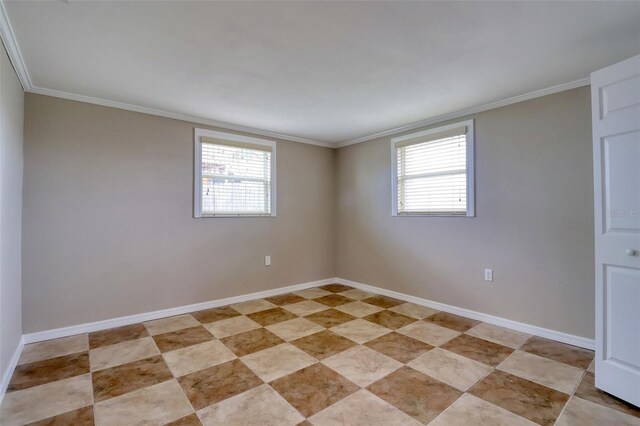 13637 Lagoon Dr, Hudson, FL 34667 - unfurnished room with healthy amount of natural light and crown molding