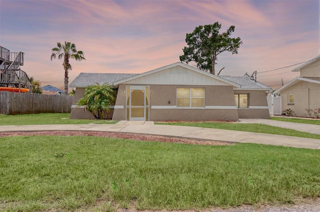 13637 Lagoon Dr, Hudson, FL 34667 - view of front of house with stucco siding and roof with shingles