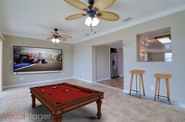 13637 Lagoon Dr, Hudson, FL 34667 - living room with a ceiling fan, billiards, and crown molding