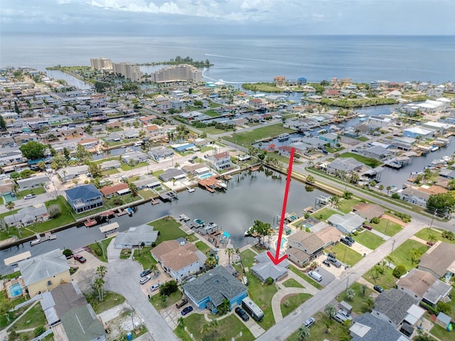 13637 Lagoon Dr, Hudson, FL 34667 - aerial overview of property's location with a nearby body of water and nearby suburban area
