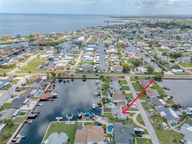 13637 Lagoon Dr, Hudson, FL 34667 - aerial view of property's location with a nearby body of water and nearby suburban area