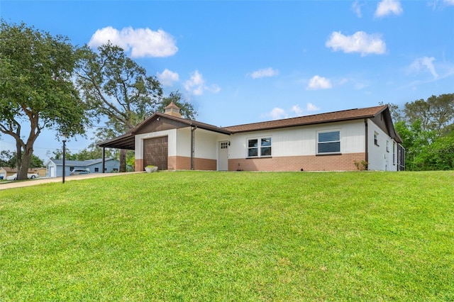 1324 Newhope Rd, Spring Hill, FL 34606 - view of front of property featuring brick siding, an attached garage, concrete driveway, and a front yard