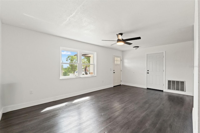 1324 Newhope Rd, Spring Hill, FL 34606 - unfurnished living room featuring a ceiling fan and dark wood finished floors