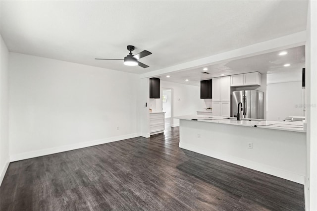 1324 Newhope Rd, Spring Hill, FL 34606 - unfurnished living room featuring recessed lighting, a ceiling fan, and dark wood-style flooring