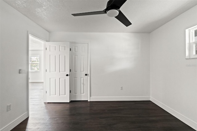 1324 Newhope Rd, Spring Hill, FL 34606 - unfurnished room with a ceiling fan and dark wood-style flooring