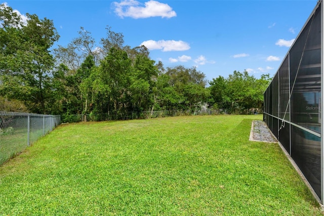 1324 Newhope Rd, Spring Hill, FL 34606 - fenced backyard featuring glass enclosure