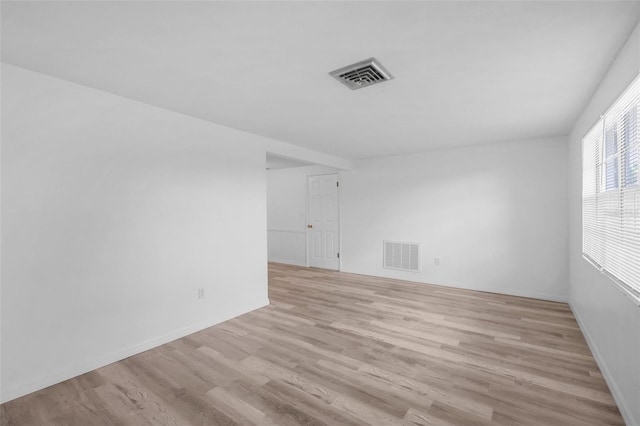 3528 Sheryl Hill Dr, Holiday, FL 34691 - empty room with light wood-type flooring and baseboards
