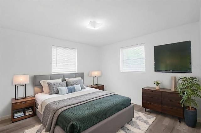 3528 Sheryl Hill Dr, Holiday, FL 34691 - bedroom with wood finished floors