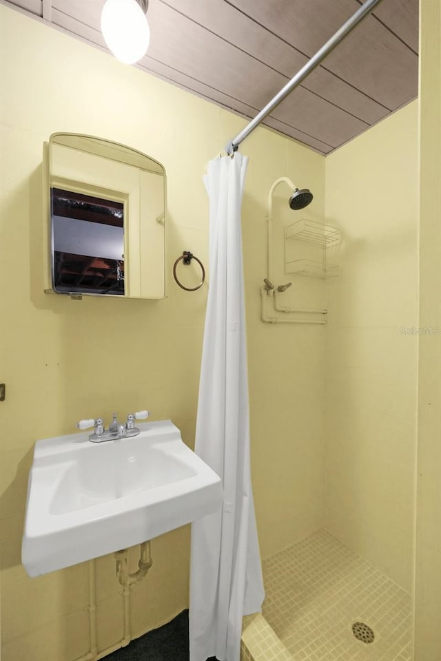 3528 Sheryl Hill Dr, Holiday, FL 34691 - bathroom featuring a stall shower and a sink