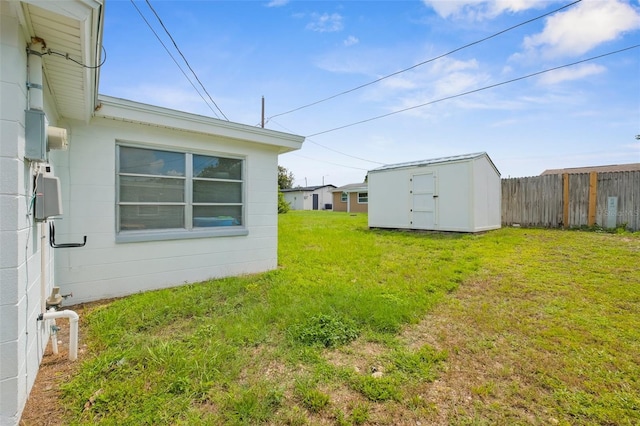 3528 Sheryl Hill Dr, Holiday, FL 34691 - fenced backyard featuring a storage shed