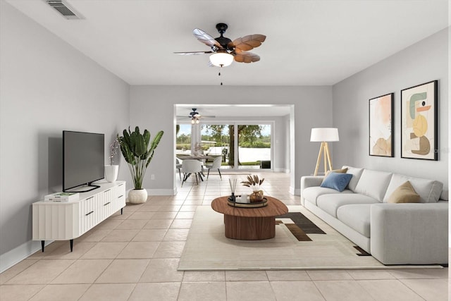 11446 W Bayshore Dr Unit 36, Crystal River, FL 34429 - living area with light tile patterned flooring and a ceiling fan