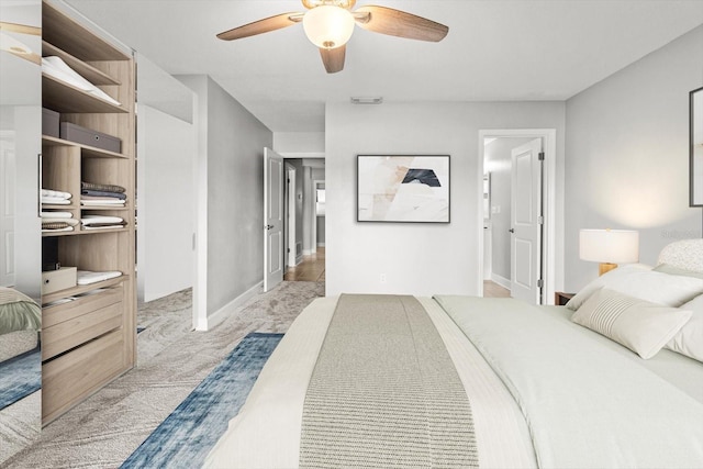 11446 W Bayshore Dr Unit 36, Crystal River, FL 34429 - bedroom featuring light carpet and ceiling fan