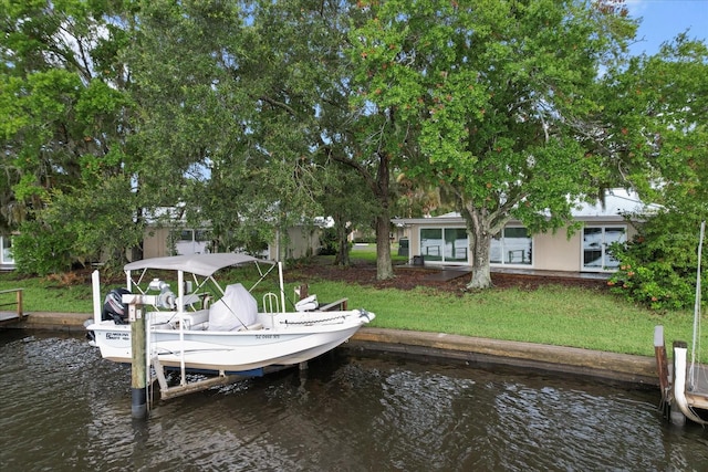 11446 W Bayshore Dr Unit 36, Crystal River, FL 34429 - dock area with a water view and a lawn