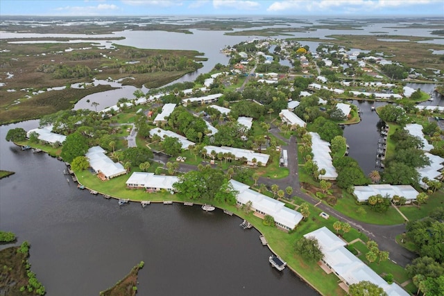 11446 W Bayshore Dr Unit 36, Crystal River, FL 34429 - aerial overview of property's location featuring a large body of water and nearby suburban area