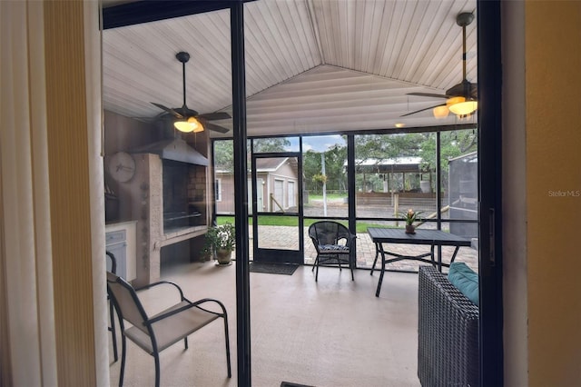 18531 Ozark Dr, Hudson, FL 34667 - sunroom featuring a ceiling fan and lofted ceiling