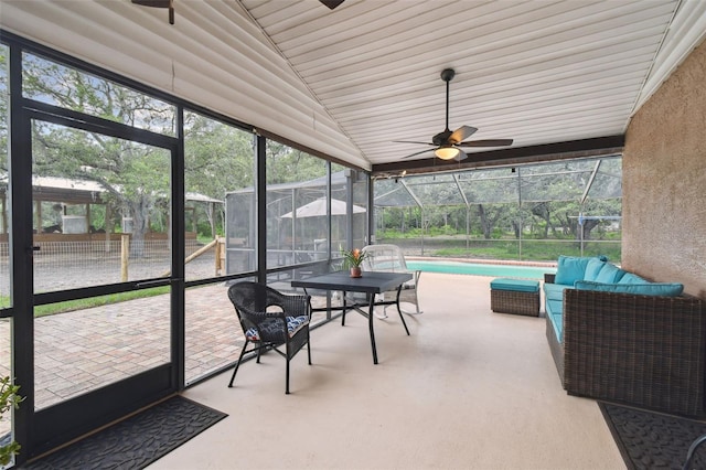 18531 Ozark Dr, Hudson, FL 34667 - sunroom / solarium featuring ceiling fan and vaulted ceiling