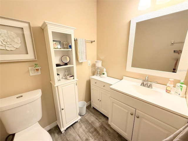 18531 Ozark Dr, Hudson, FL 34667 - bathroom featuring vanity and wood finished floors