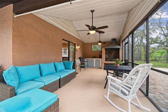 18531 Ozark Dr, Hudson, FL 34667 - sunroom / solarium with an outdoor hangout area, outdoor dining area, ceiling fan, and lofted ceiling