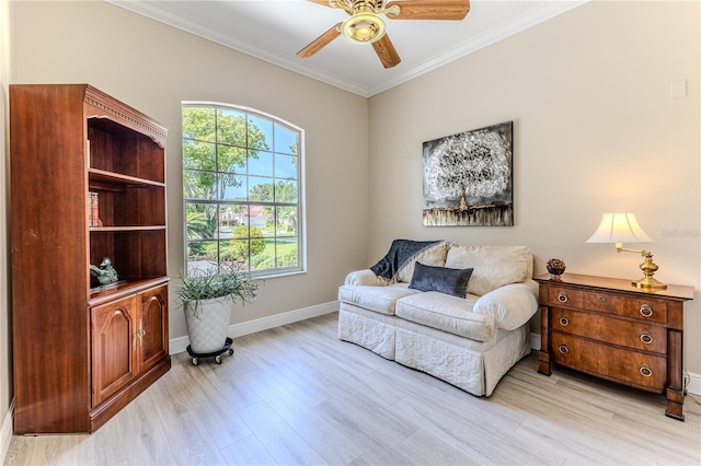 5301 Legend Hills Ln, Spring Hill, FL 34609 - living area with ornamental molding, ceiling fan, and light wood-style floors