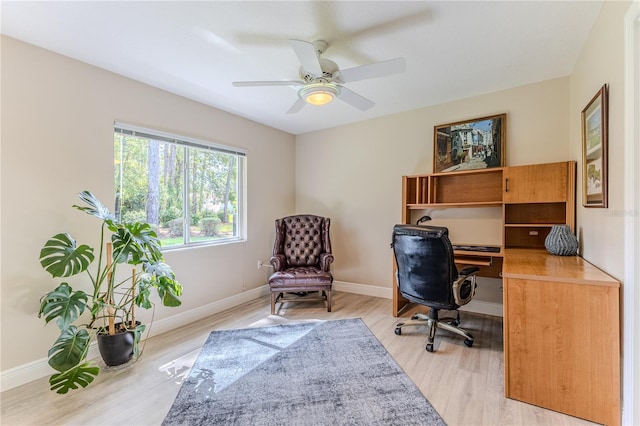 5301 Legend Hills Ln, Spring Hill, FL 34609 - office space with light wood finished floors and a ceiling fan