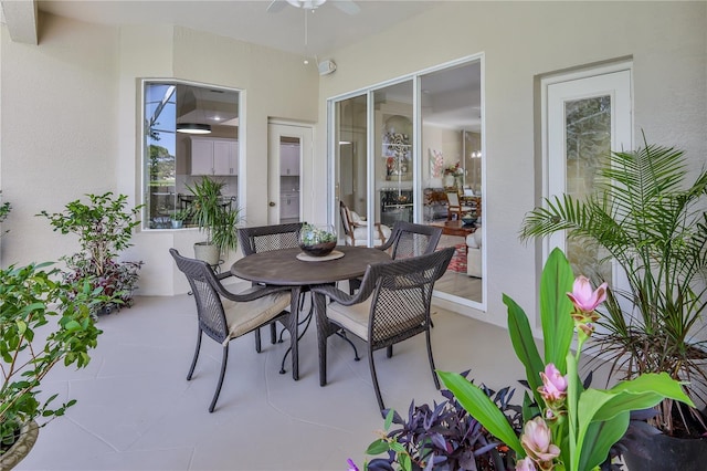 5301 Legend Hills Ln, Spring Hill, FL 34609 - view of patio / terrace with ceiling fan and outdoor dining space