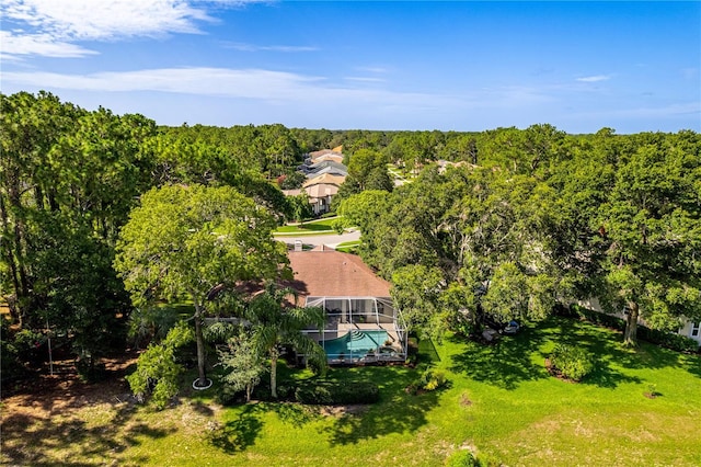 5301 Legend Hills Ln, Spring Hill, FL 34609 - aerial view of property and surrounding area with a forest