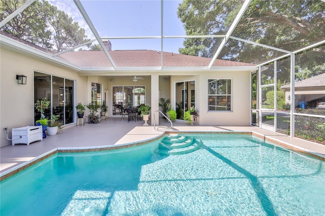 5301 Legend Hills Ln, Spring Hill, FL 34609 - swimming pool featuring a patio, a lanai, and ceiling fan