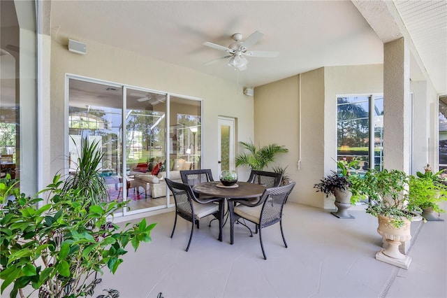 5301 Legend Hills Ln, Spring Hill, FL 34609 - sunroom / solarium featuring a ceiling fan and plenty of natural light