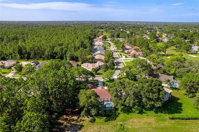 5301 Legend Hills Ln, Spring Hill, FL 34609 - aerial view of property's location with a heavily wooded area and nearby suburban area