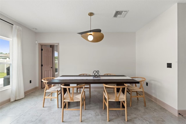 12948 Conquistador Loop, Spring Hill, FL 34610 - dining room with baseboards