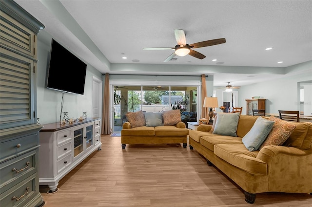 9863 Deer St, Spring Hill, FL 34608 - living area featuring ceiling fan, light wood-type flooring, and recessed lighting
