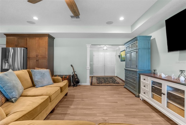 9863 Deer St, Spring Hill, FL 34608 - living area with light wood-type flooring, recessed lighting, ceiling fan, and ornate columns