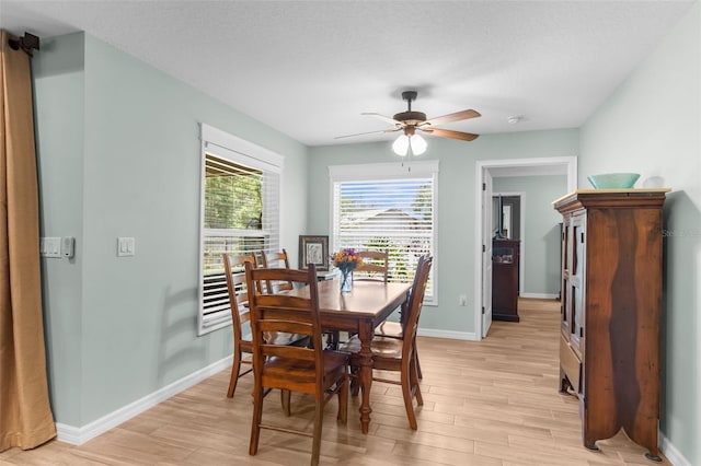 9863 Deer St, Spring Hill, FL 34608 - dining space featuring light wood-style flooring and ceiling fan