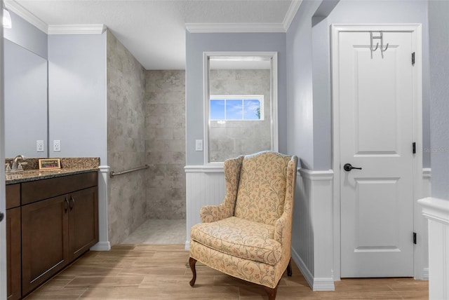 9863 Deer St, Spring Hill, FL 34608 - living area with light wood finished floors and ornamental molding