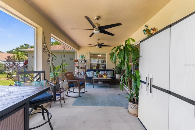 9863 Deer St, Spring Hill, FL 34608 - view of patio / terrace with an outdoor hangout area, ceiling fan, and outdoor dining space