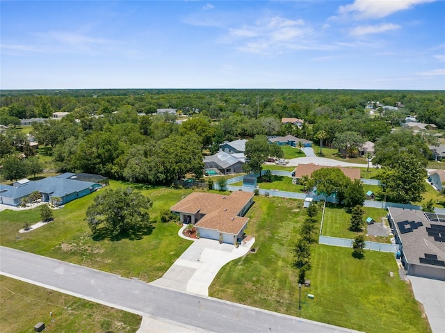 9863 Deer St, Spring Hill, FL 34608 - aerial perspective of suburban area featuring a heavily wooded area