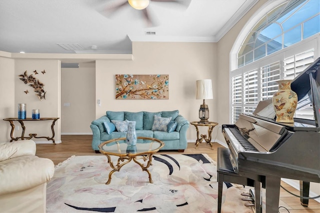 1610 Winding Willow Dr, Trinity, FL 34655 - living room featuring crown molding, ceiling fan, and wood finished floors