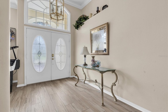 1610 Winding Willow Dr, Trinity, FL 34655 - entrance foyer featuring ornamental molding and wood finished floors