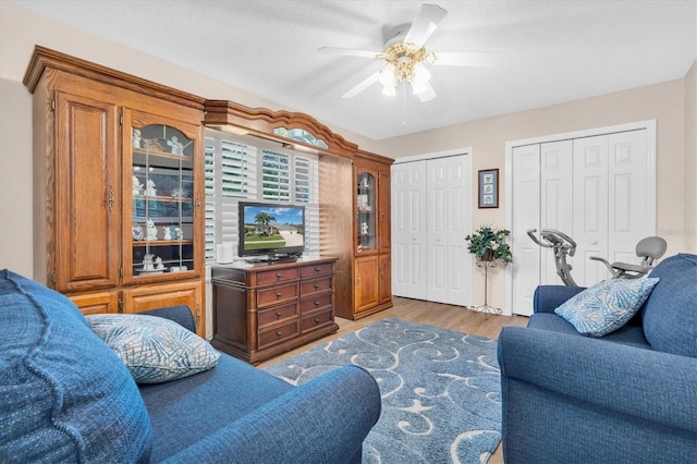 1610 Winding Willow Dr, Trinity, FL 34655 - living room featuring ceiling fan and wood finished floors