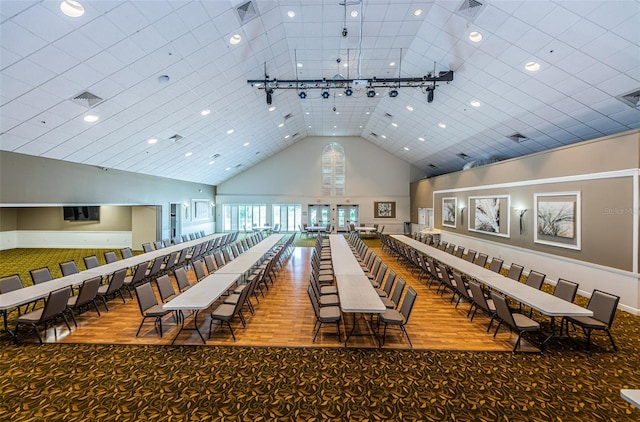 1610 Winding Willow Dr, Trinity, FL 34655 - miscellaneous room featuring high vaulted ceiling, wood finished floors, recessed lighting, and carpet floors