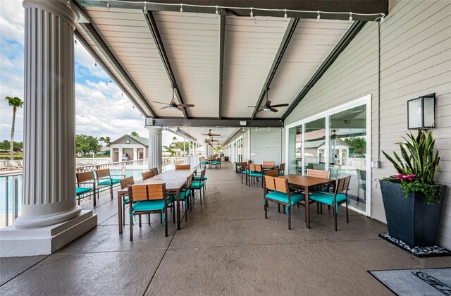 1610 Winding Willow Dr, Trinity, FL 34655 - view of patio / terrace featuring outdoor dining area and a ceiling fan